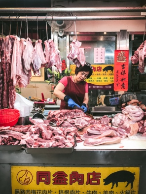 lady cutting meat